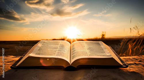 Bible book on the sunset. Easter concept.