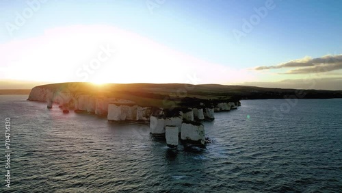 Aerial Drone View of Old Harry Rocks at sunset. View of Studland Bay, Handfast point of the Dorset coastline in England photo