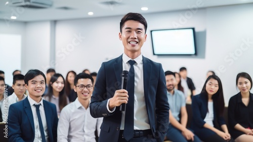 Asian young business man in front of a group