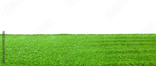 Green artificial grass surface isolated on white photo