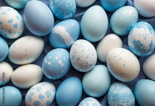 A serene Easter background featuring delicately painted eggs with a white and blue palette, ideal for festive holiday designs.