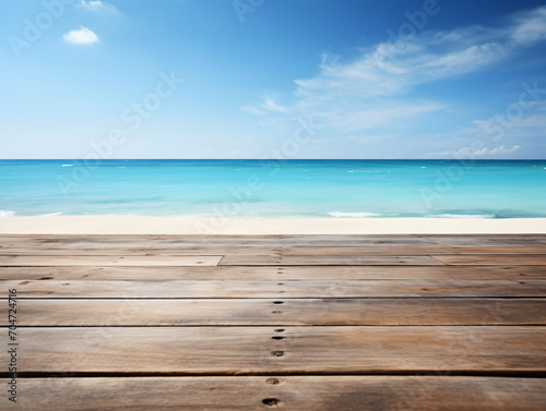 Empty wooden dock with the beach and ocean in the background,