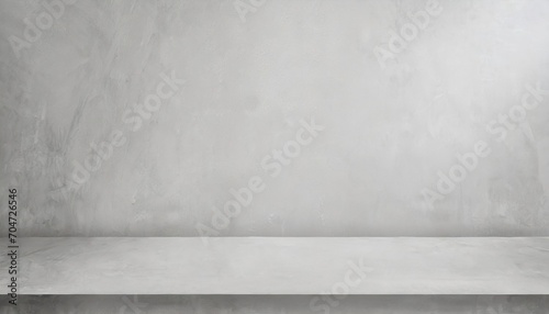 A grey wall background with space.