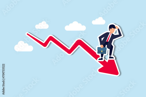 Economic recession, stock market plunge or falling down, cryptocurrency crash or financial crisis from inflation concept, businessman investor standing on falling down red graph look for bottom.