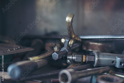 Mechanic tools engineering equipment car auto repair shop with copy space. Blurred background mechanical service. Heavy screw grungy rusted wrenches dirty screwdriver object. Industrial hardware set photo