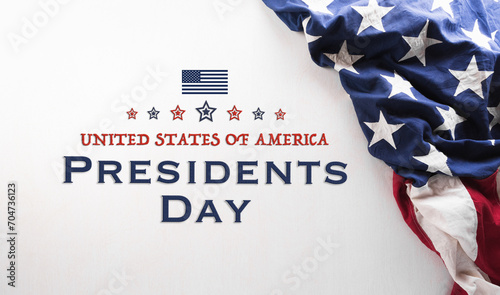 Happy Presidents day concept made from American flag and the text on white wooden background.