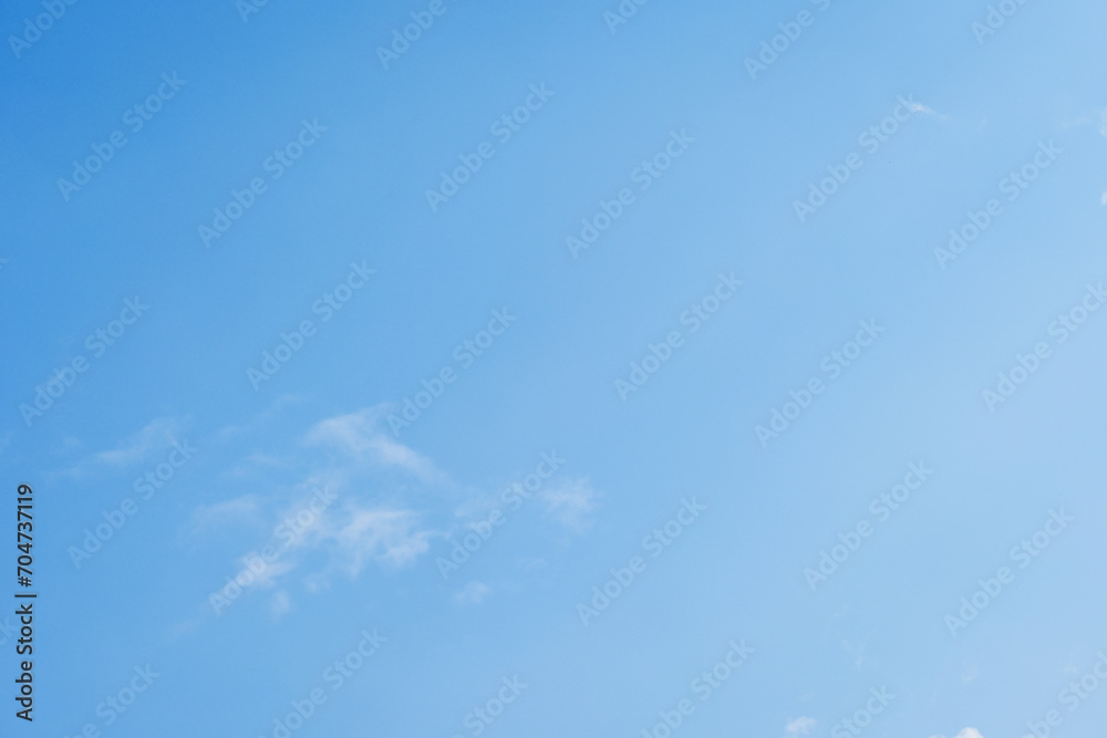 beautiful blue sky and white fluffy cloud with sunrise in the morning, natural background