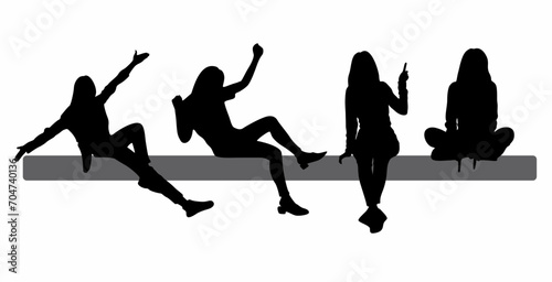 set of vector silhouettes of sitting women