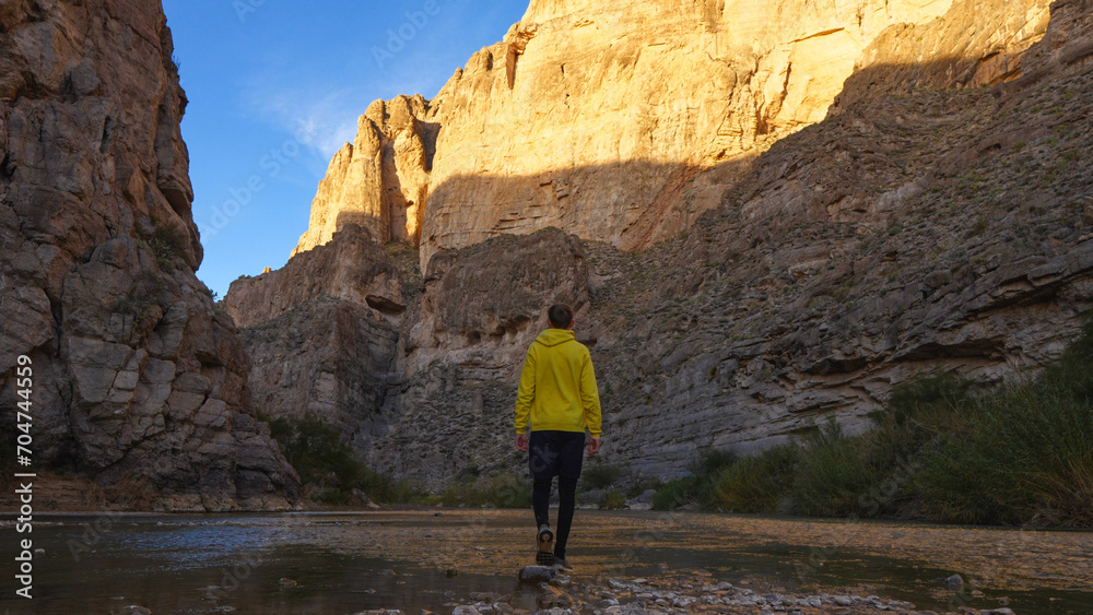 Man hiking in a canyon at Big Bend National Park, Texas