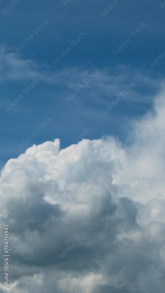 Blue sky with fluffy cloud time lapse on a sunny day 4k footage. Blue sky with fluffy cloud time lapse on a sunny day 4k footage.