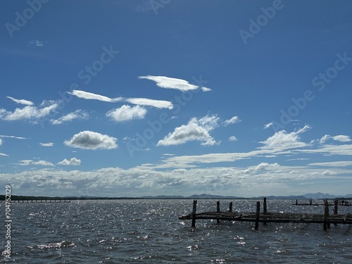Bilde på lerret Sail unfurls like a butterfly's wing, slicing through turquoise bliss