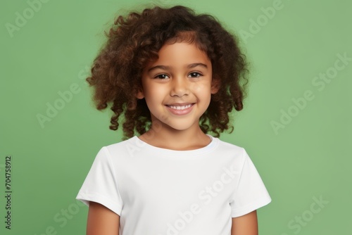 happy african american little girl in white blank t-shirt