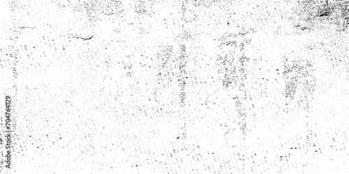 Abstract grain and dust grunge effect vector. Grainy surface texture vector on a white background. Grainy and distressed black and white texture. Abstract grimy concrete texture. 