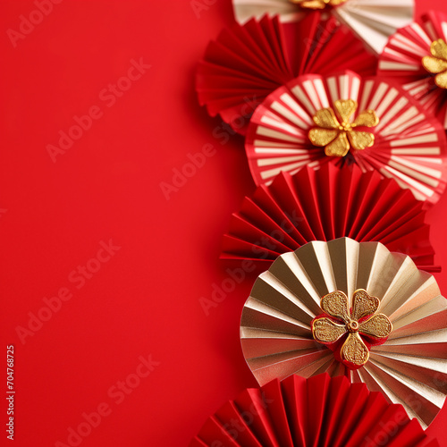 Traditional festival paper fans with gold flowers