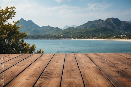 Wooden dock with blurred background of mountains and sea