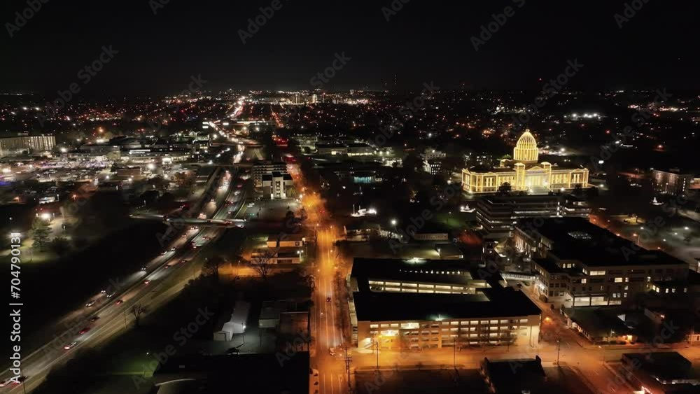 Arkansas State Capitol building at night in Little Rock, Arkansas with drone video wide shot stable. Arkansas State Capitol building at night in Little Rock, Arkansas with drone video wide shot stable.
