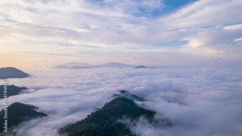 Hyperlapse aerial view drone flying over sea of fog at sunrise,nature time lapse hyperlapse,Unseen travel in Northern Thailand.