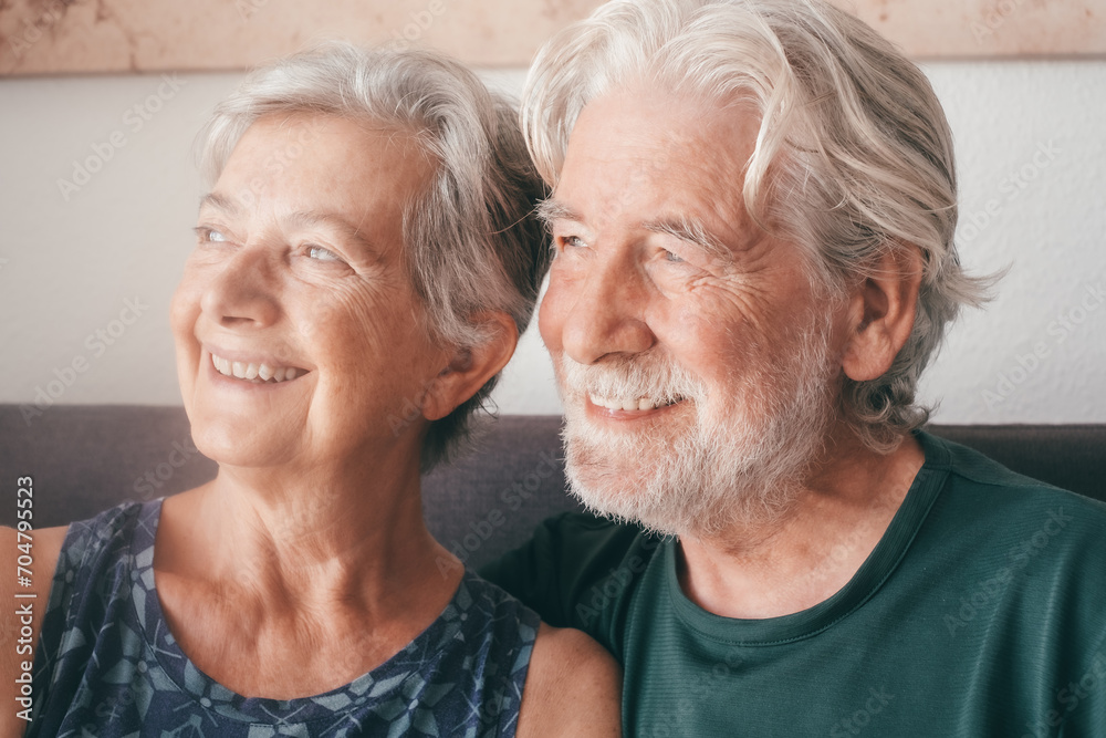 Elderly grandfather and grandmother spend time together in retirement lifestyle, older generation enjoying relax at home looking at side Elderly grandfather and grandmother spend time together in retirement lifestyle, older generation enjoying relax at home looking at side