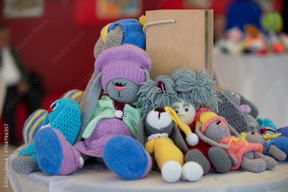 Handmade knitted toys are different and colorful.