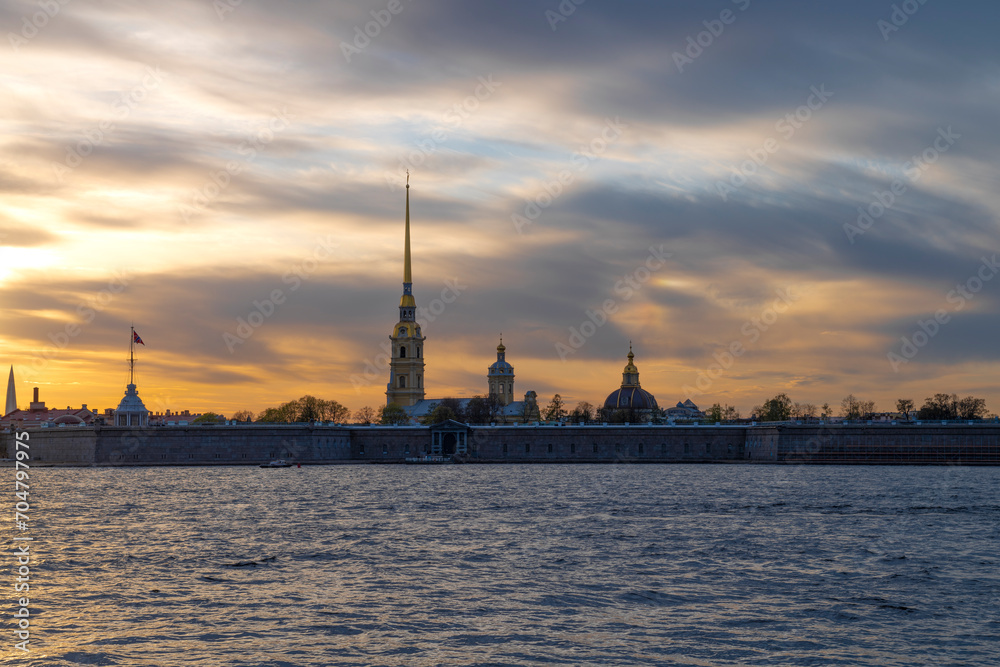 May cloudy sunset at the ancient Peter and Paul Fortress. Saint-Petersburg, Russia