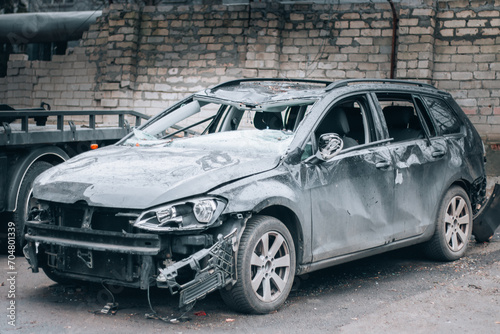 Dnepr, Ukraine – January 6: Russian drones attacked the Dnieper. Burnt and damaged cars in the Dnieper. Utility services clean up the aftermath of the attack on the city.