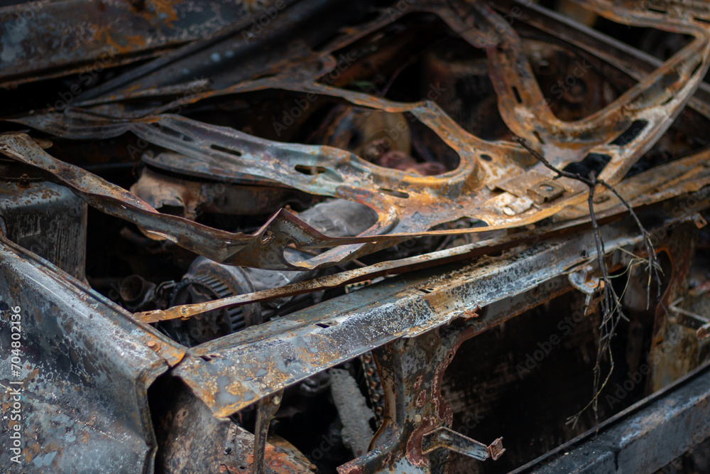 Dnepr, Ukraine – January 6: Russian drones attacked the Dnieper. Burnt and damaged cars in the Dnieper. Utility services clean up the aftermath of the attack on the city. Dnepr, Ukraine – January 6: Russian drones attacked the Dnieper. Burnt and damaged cars in the Dnieper. Utility services clean up the aftermath of the attack on the city.