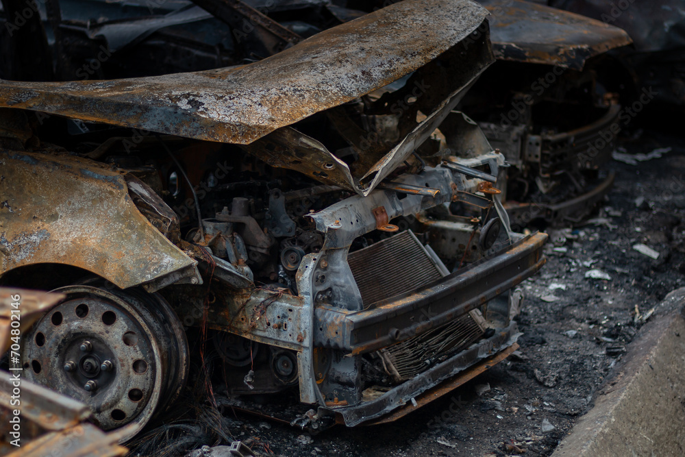 Dnepr, Ukraine – January 6: Russian drones attacked the Dnieper. Burnt and damaged cars in the Dnieper. Utility services clean up the aftermath of the attack on the city. Dnepr, Ukraine – January 6: Russian drones attacked the Dnieper. Burnt and damaged cars in the Dnieper. Utility services clean up the aftermath of the attack on the city.