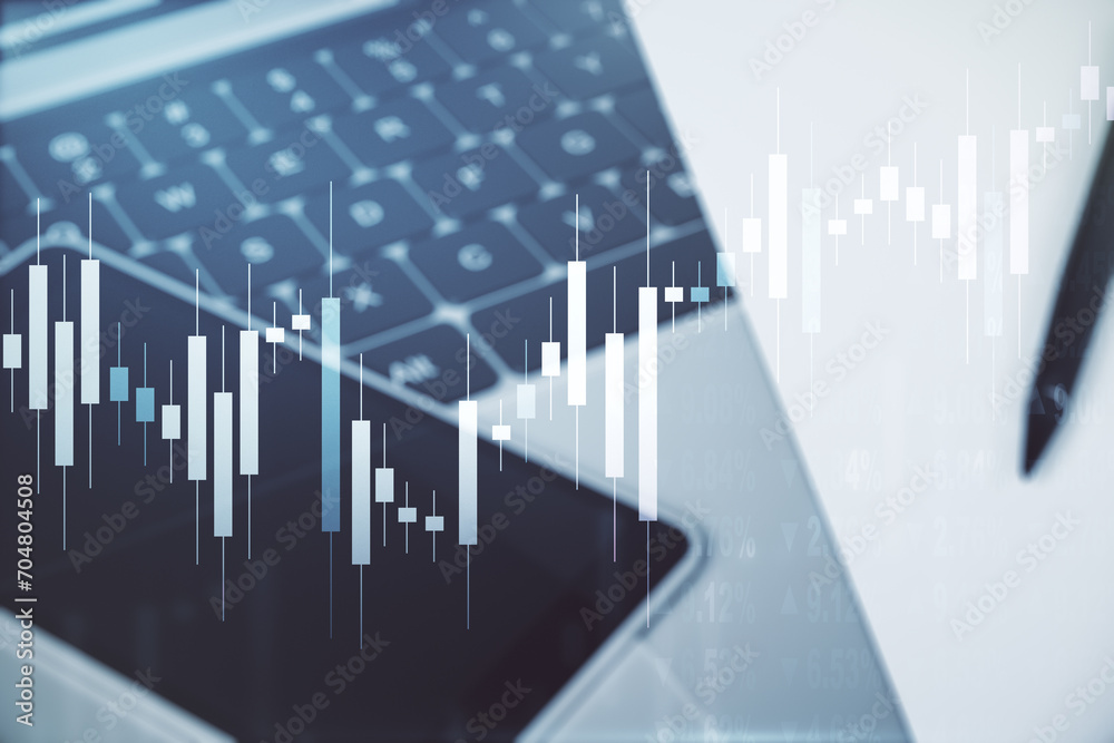 Abstract creative financial graph on modern laptop background, financial and trading concept. Multiexposure Abstract creative financial graph on modern laptop background, financial and trading concept. Multiexposure
