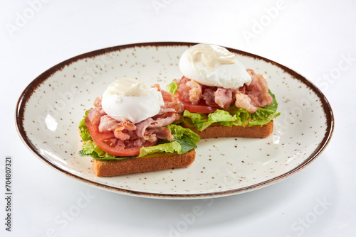 toast with poached egg and bacon