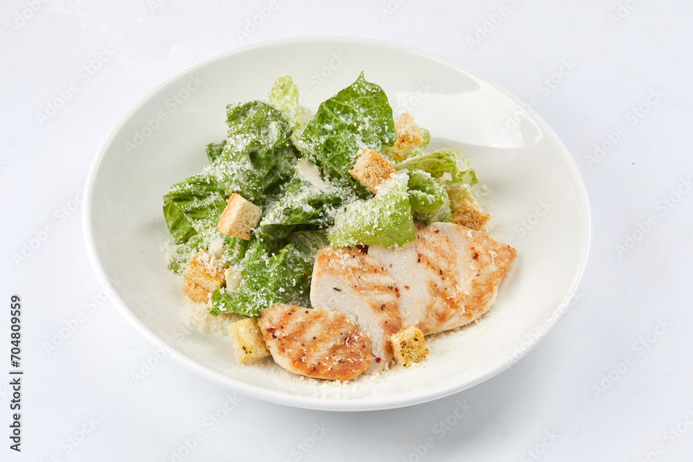 Caesar salad on the white background Caesar salad on the white background