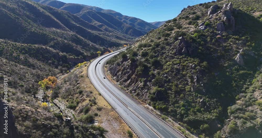 Drone Flying over Curvy Road in Between Mountains. Arizona State Route 87 Drone Flying over Curvy Road in Between Mountains. Arizona State Route 87