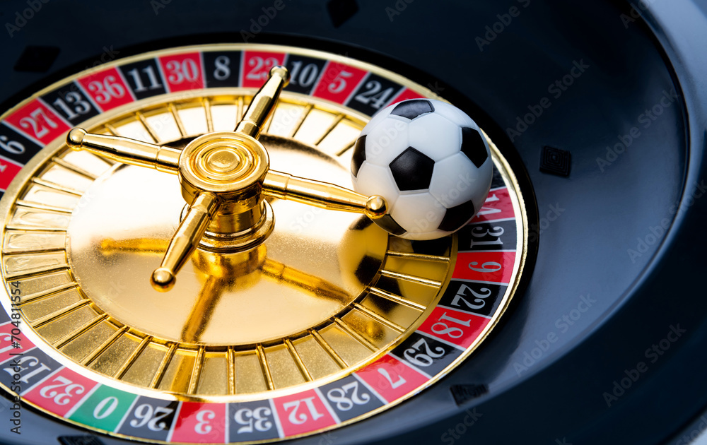 Soccer ball on roulette wheel Soccer ball on roulette wheel