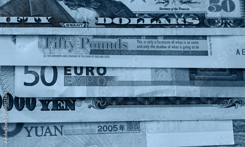 Background of worlds various currencies photo
