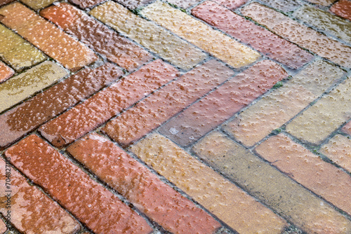 Close up of slippery conditions caused by glaze ice on surface of the street during the winter season.