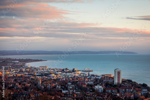 January sunrise from Beachy head over the coastal town of Eastbourne on the east Sussex coast south east England UK