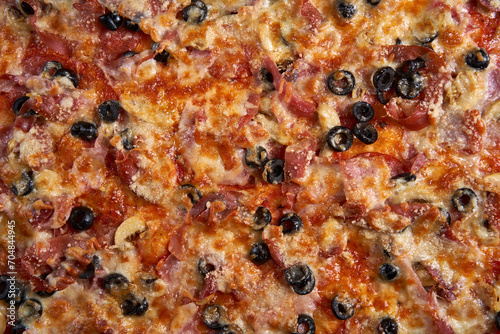 Macro shot showing details with melted parmesan on a pizza