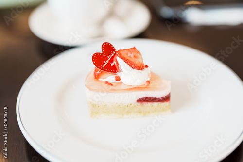 Homemade Cheese Cake with fresh strawberries and hot Tea cup. Dessert and beverage for Happy Valentine Day celebration