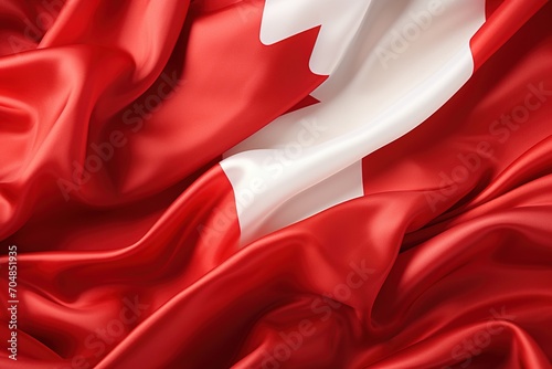 A red and white Canadian flag made of silk photo