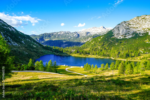 Großsee on the high plateau of the Tauplitzalm. View of the lake at the Toten Gebirge in Styria. Idyllic landscape with mountains and a lake on the Tauplitz.
 photo