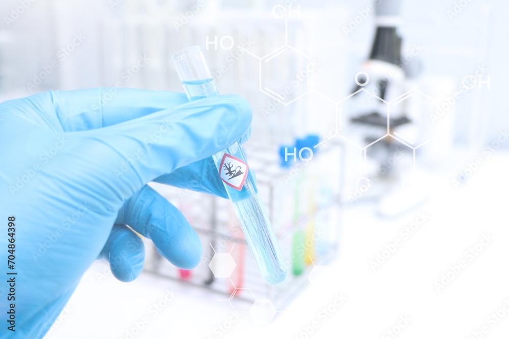 Fototapeta premium Environmental hazard Symbols of chemicals in test tubes, chemicals in the laboratory