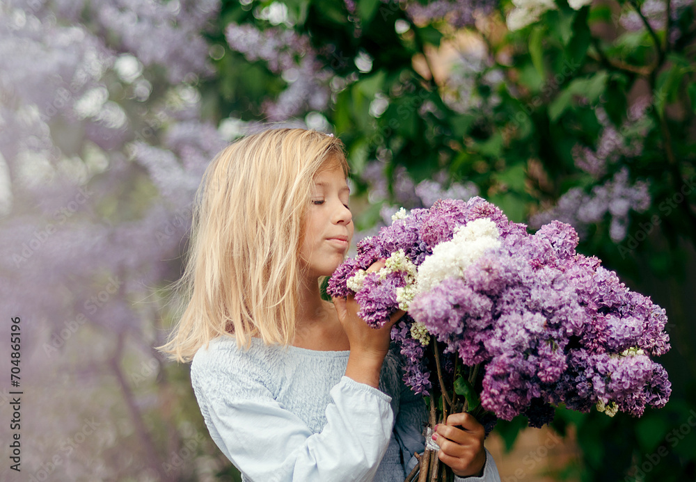 beautiful young girl with a bouquet of lilacs, a girl in lilacs, lilacs in spring. Young beautiful brunette girl posing with a bouquet of lilac beautiful young girl with a bouquet of lilacs, a girl in lilacs, lilacs in spring. Young beautiful brunette girl posing with a bouquet of lilac