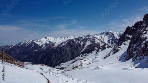 View of the city and the mountains from Shimbulak. 