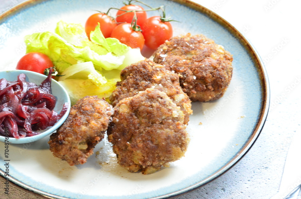 a traditional Czech dish of fried meatballs, minced meat with vegetables, a traditional Czech dish of fried meatballs, minced meat with vegetables,