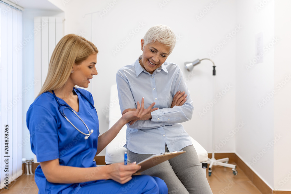 Lets set up an appointment for next week. Young female doctor going through medical records with his senior female patient. Lets set up an appointment for next week. Young female doctor going through medical records with his senior female patient.