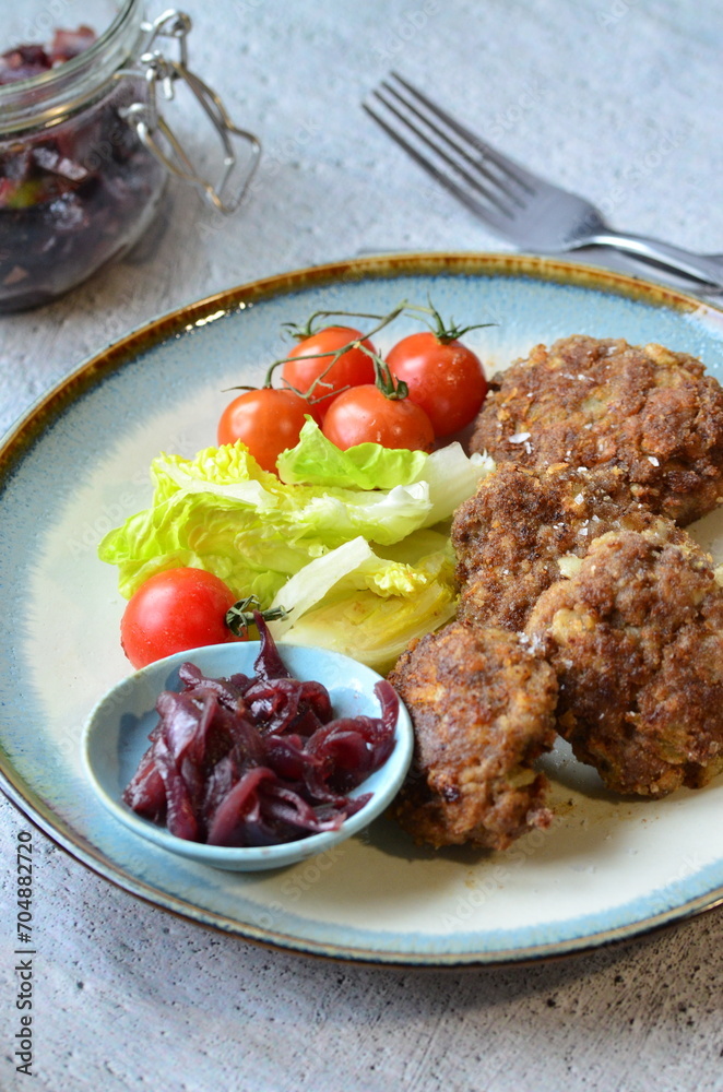 a traditional Czech dish of fried meatballs, minced meat with vegetables, a traditional Czech dish of fried meatballs, minced meat with vegetables,