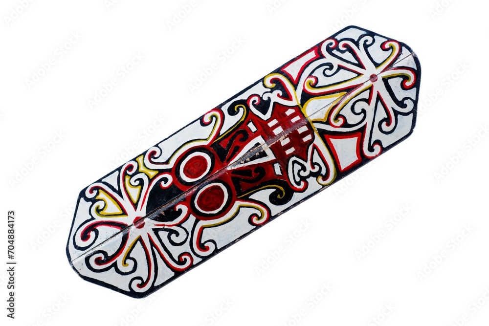 Tameng. is a traditional Indonesian shield from the Dayak tribe, made of wood, animal skins or iron with traditional carvings or paintings. Dayak Shield Isolated on white Tameng. is a traditional Indonesian shield from the Dayak tribe, made of wood, animal skins or iron with traditional carvings or paintings. Dayak Shield Isolated on white