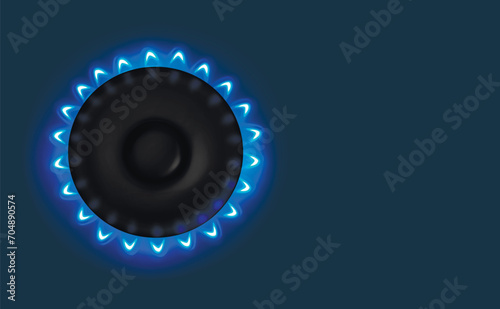Gas burner with blue flame, glowing fire ring in blue color on the kitchen stove. Realistic model of burning propane-butane gas. View from above. copy space.