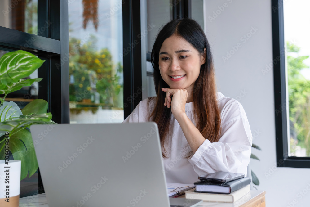 Businesswomen drive online store success together. Businesswomen drive online store success together.