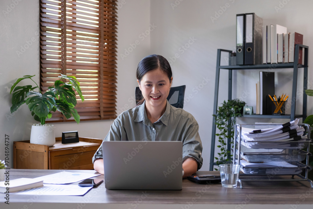 Businesswomen drive online store success together. Businesswomen drive online store success together.