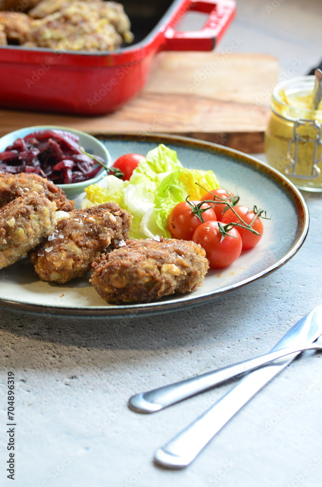 a traditional Czech dish of fried meatballs, minced meat with vegetables,